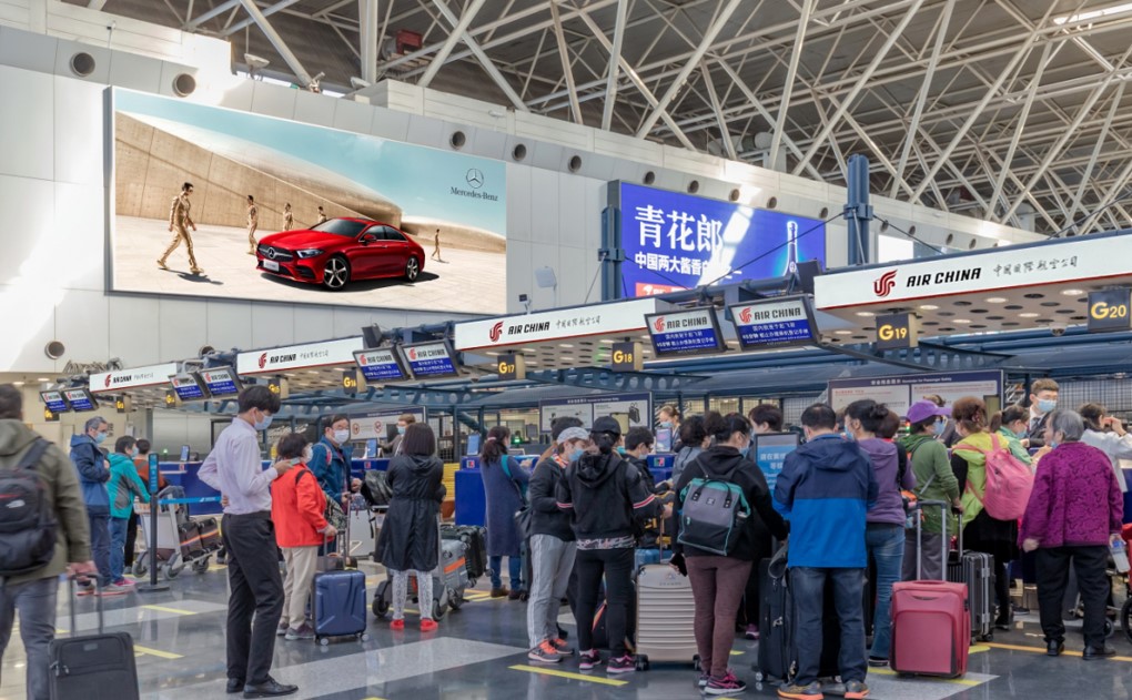 Domestic departure lightbox advertisement at Capital Airport